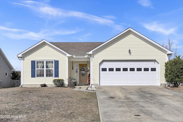 ranch-style home with a garage, concrete driveway, and a shingled roof