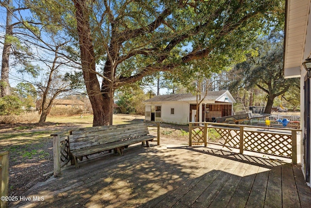 deck featuring an outdoor structure