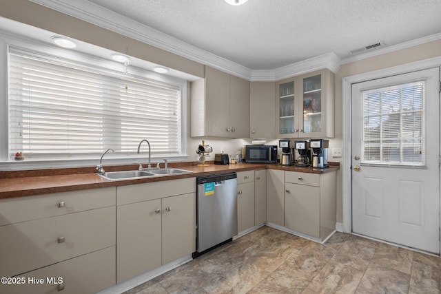 kitchen featuring visible vents, a sink, stainless steel dishwasher, dark countertops, and black microwave