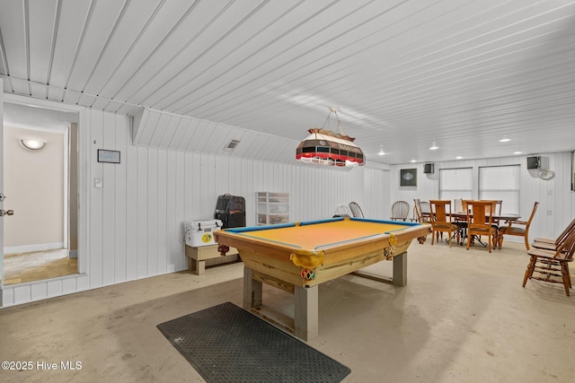 recreation room with concrete floors