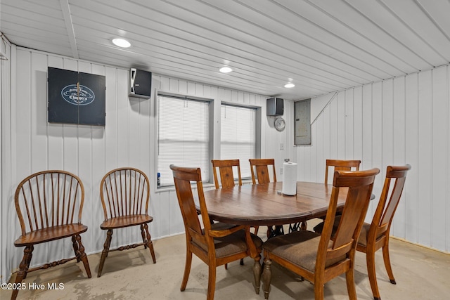 dining area featuring recessed lighting and concrete flooring