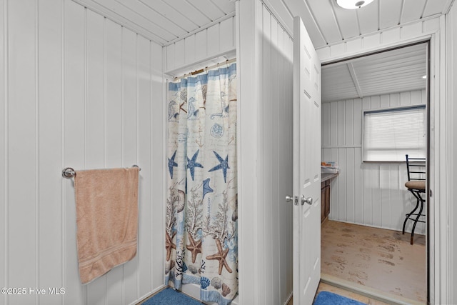 bathroom with curtained shower