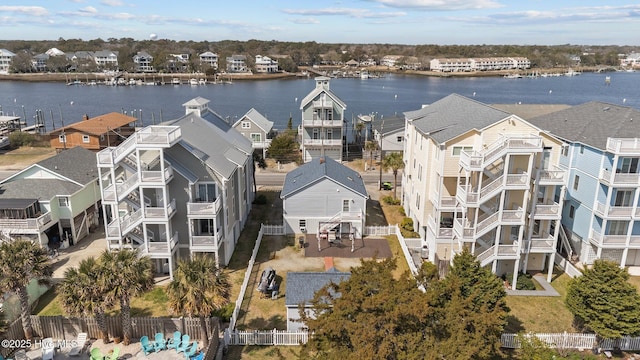 bird's eye view featuring a residential view and a water view