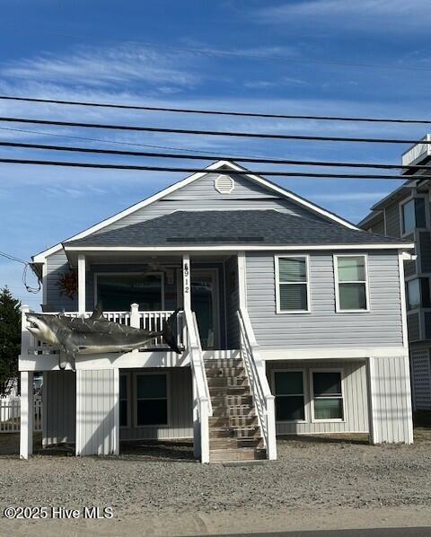 view of front of house with stairway