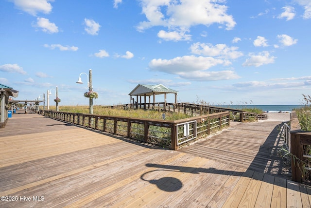 exterior space with a gazebo and a water view