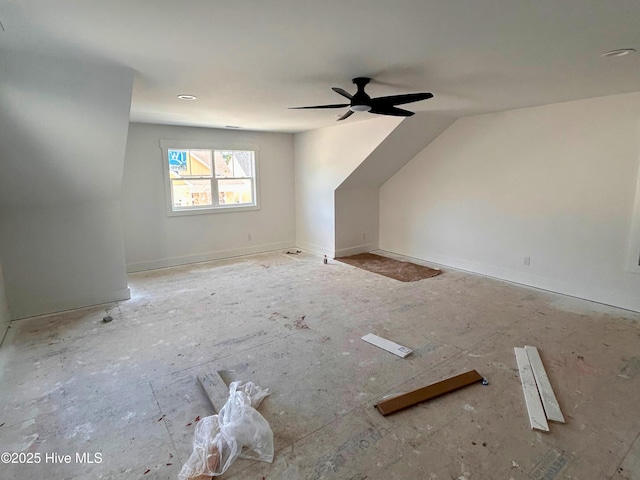 additional living space featuring a ceiling fan