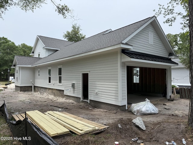 9118 E Lake Rd, Calabash, NC 28467 - back of property with a shingled roof