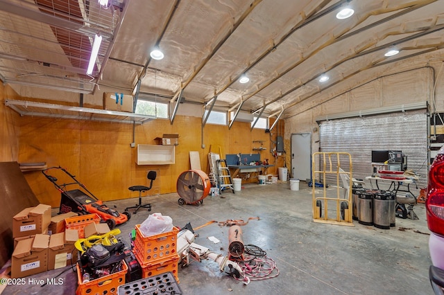 interior space featuring wooden walls