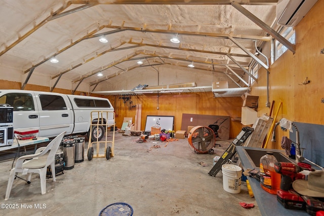 garage with an AC wall unit