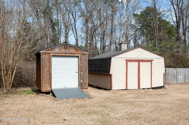 view of shed with fence