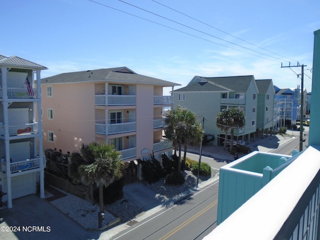 view of property with a residential view