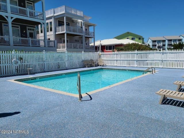 pool featuring fence