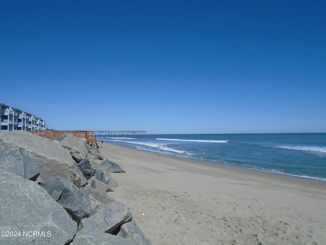 property view of water featuring a view of the beach