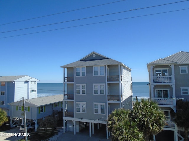 view of building exterior with a water view