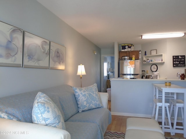 living area featuring wood finished floors