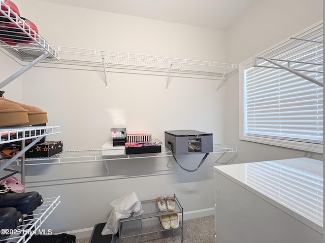 washroom featuring baseboards