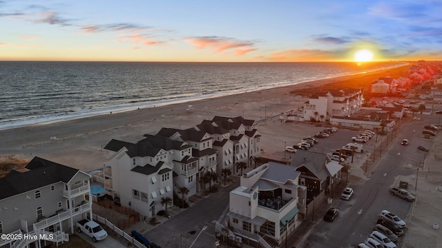 aerial view with a view of the beach and a water view