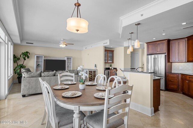 dining room featuring visible vents, ornamental molding, a ceiling fan, and recessed lighting