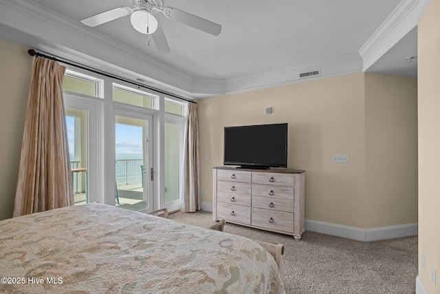 bedroom with carpet floors, crown molding, visible vents, access to outside, and baseboards