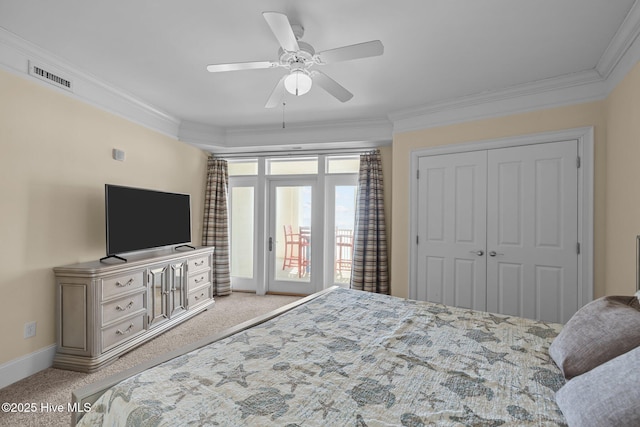 carpeted bedroom featuring access to outside, visible vents, and crown molding