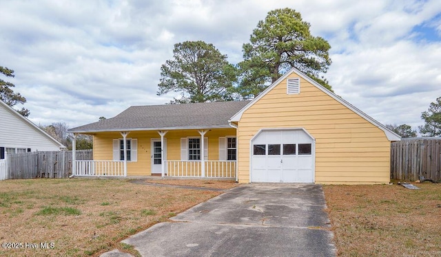 view of front of property featuring an attached garage, aphalt driveway, fence, and a porch