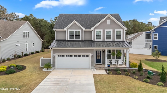 172 Everett Park Trl, Holly Ridge, NC 28445 - traditional home featuring a porch, driveway, and a front lawn