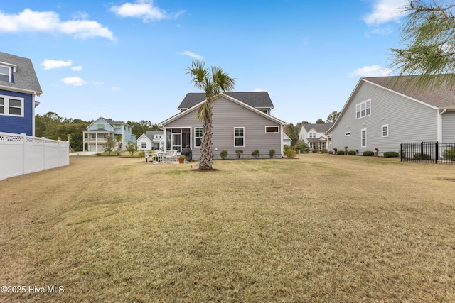 172 Everett Park Trl, Holly Ridge, NC 28445 - back of house featuring a sunroom