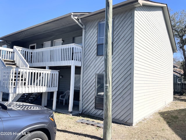 view of home's exterior featuring stairs