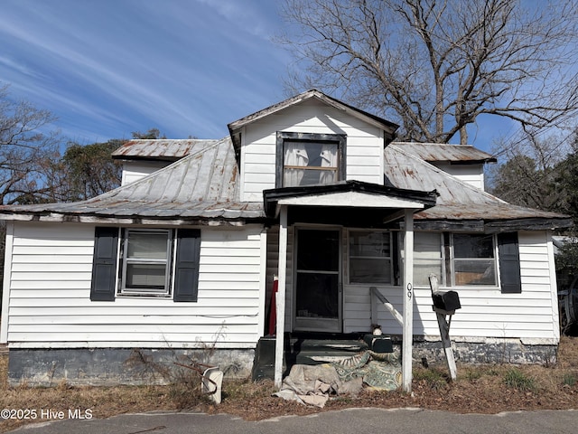 bungalow-style house with metal roof