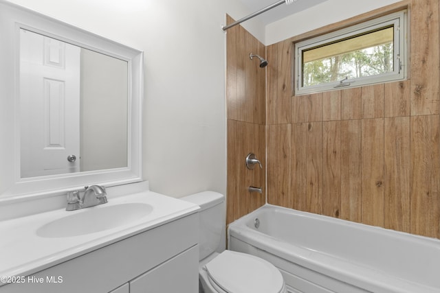 bathroom featuring vanity, toilet, and shower / bathtub combination