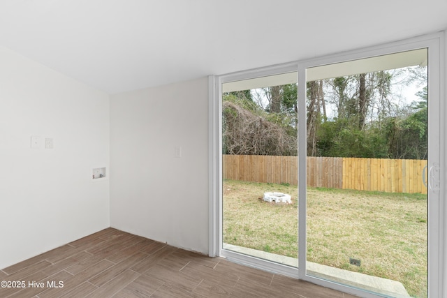 doorway featuring wood finish floors