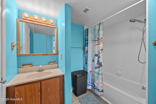 bathroom featuring vanity, shower / tub combo, tile patterned flooring, and visible vents