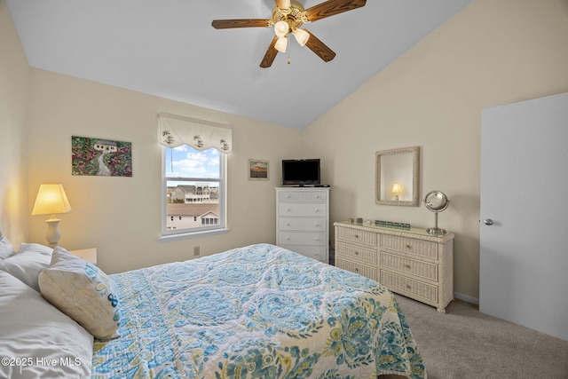 carpeted bedroom with lofted ceiling and a ceiling fan