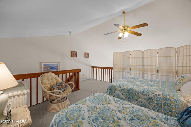 carpeted bedroom featuring vaulted ceiling and a ceiling fan