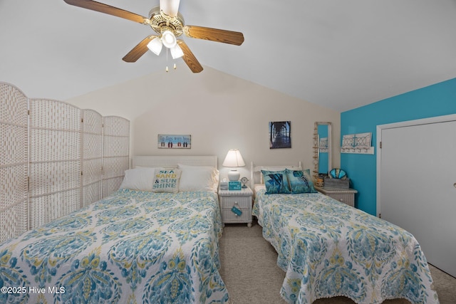 carpeted bedroom with lofted ceiling and a ceiling fan