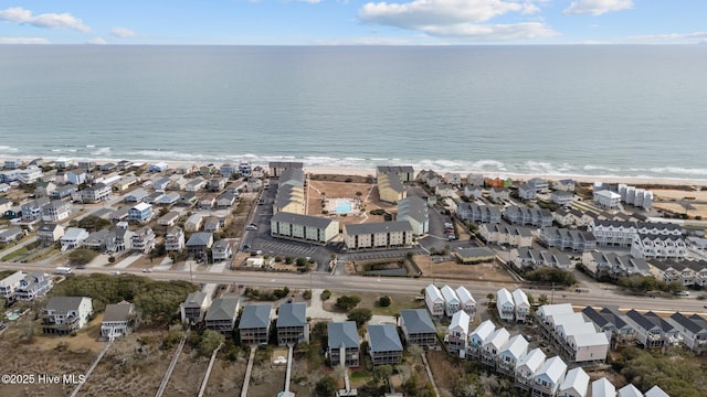 birds eye view of property featuring a residential view and a water view