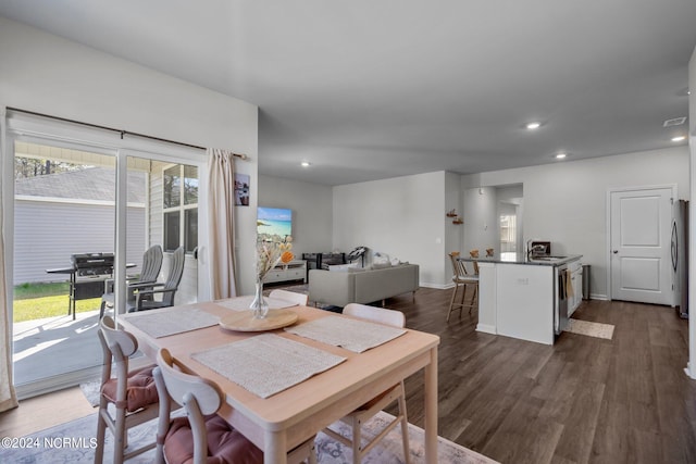 dining room featuring recessed lighting, visible vents, dark wood finished floors, and baseboards