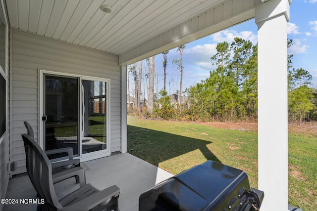 view of patio with a grill