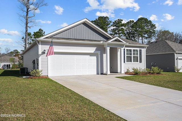 view of front of home with a garage, driveway, central AC unit, a front lawn, and board and batten siding