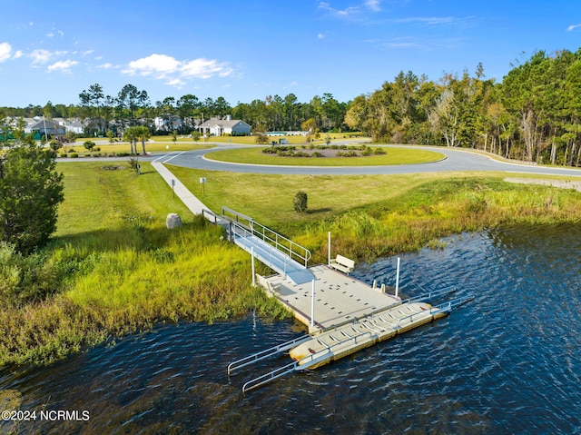 dock area featuring a water view