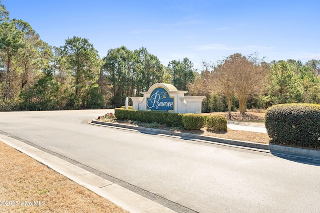 community sign with driveway