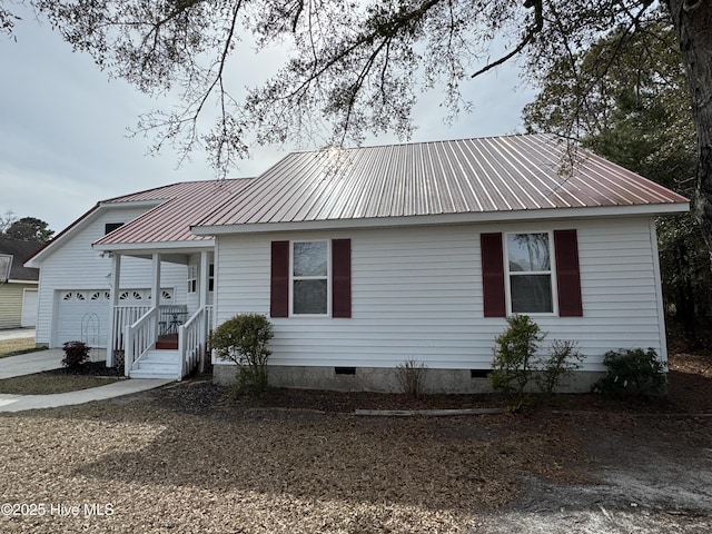 single story home featuring crawl space and metal roof