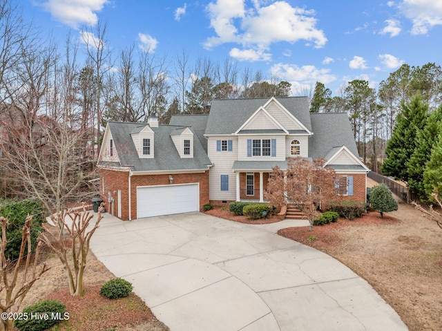 traditional-style home featuring crawl space, driveway, a garage, and brick siding