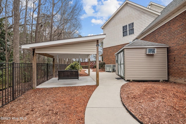 exterior space featuring a fenced backyard and cooling unit