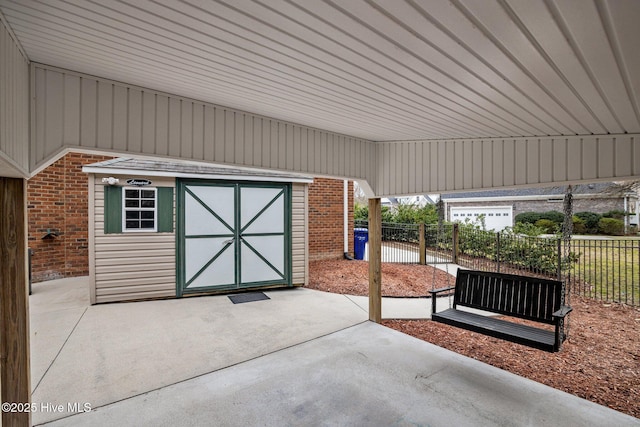 view of patio featuring fence