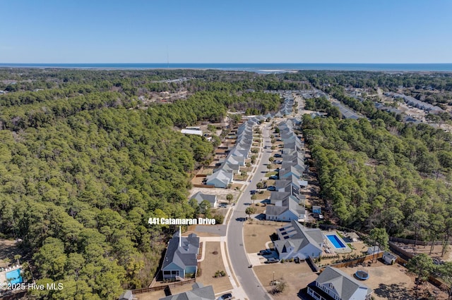 bird's eye view with a forest view