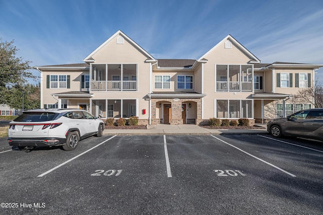 view of front of home with uncovered parking