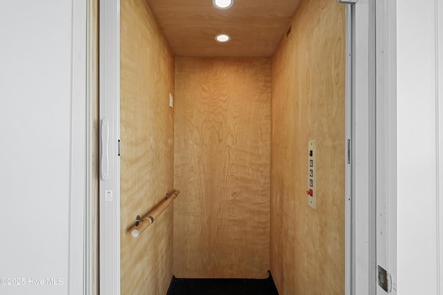 interior details with elevator and recessed lighting