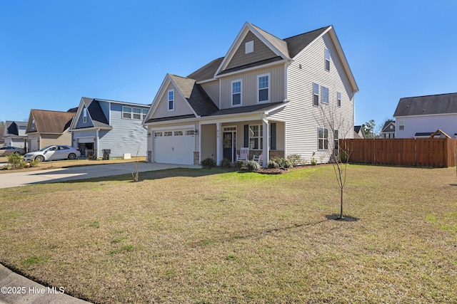 view of front of house with a front lawn, fence, covered porch, concrete driveway, and a garage