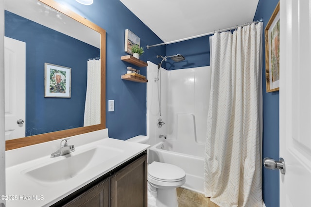 bathroom with tile patterned floors, shower / bath combination with curtain, toilet, and vanity